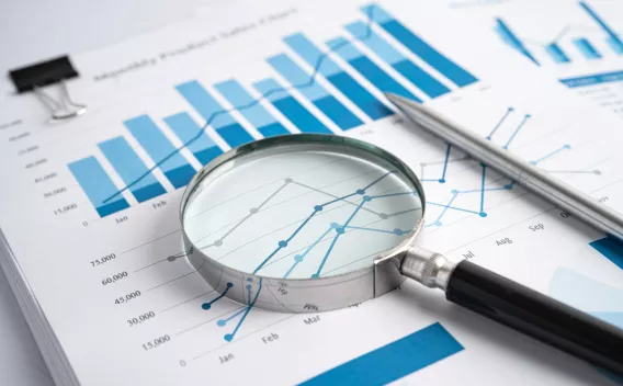 magnifying glass on chart